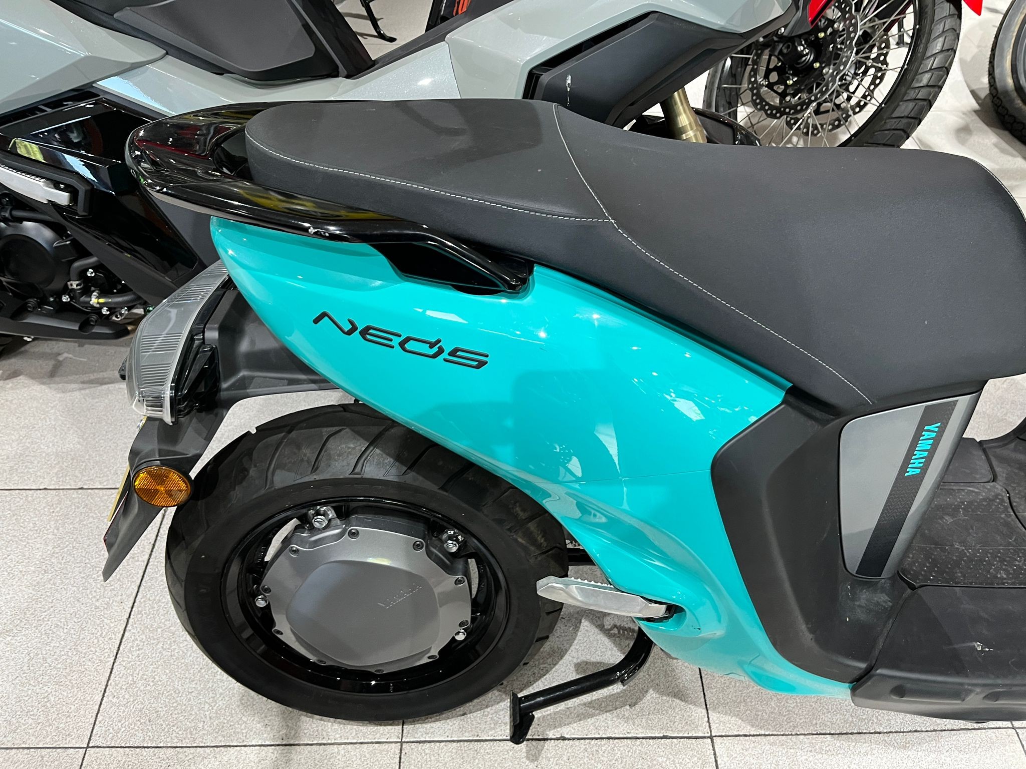 NEOS